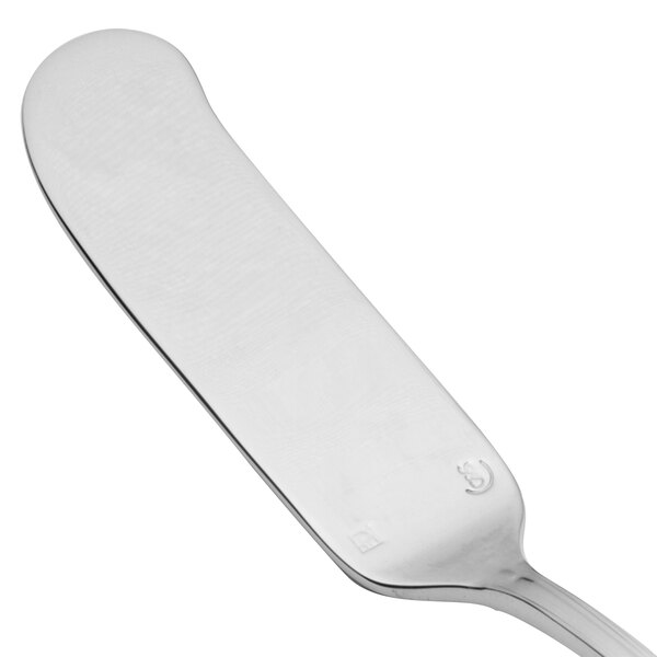 A silver Chef & Sommelier stainless steel butter spreader with a white handle.