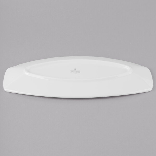 A white porcelain oval tray.