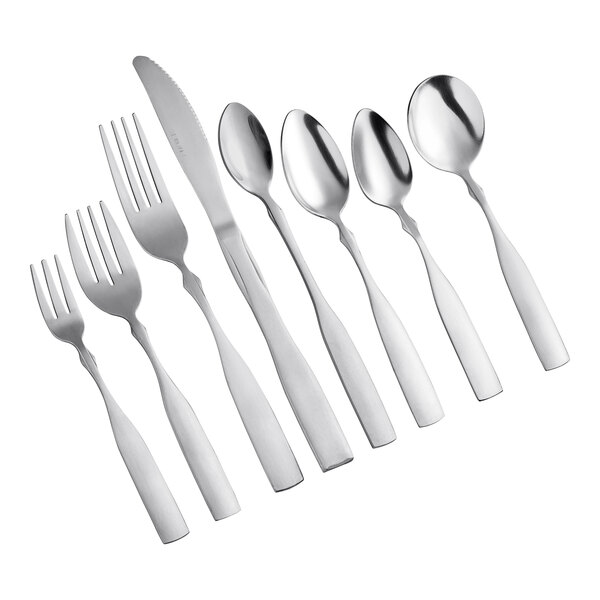 A group of Choice Delmont stainless steel spoons.