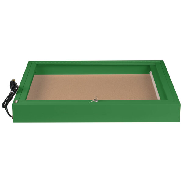 A green rectangular Aarco bulletin board cabinet with a key and light.