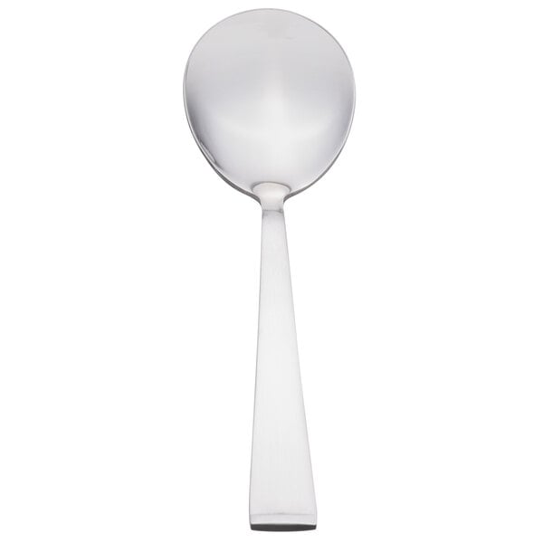 A silver spoon with a long handle.