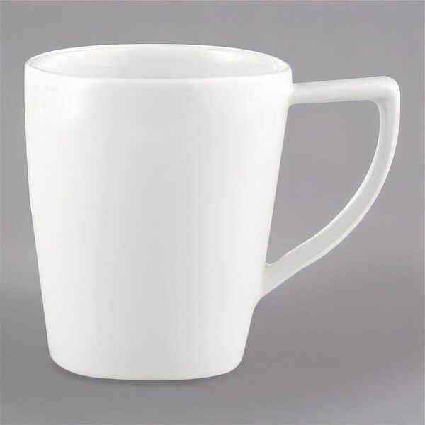 A Schonwald white porcelain mug with a handle.