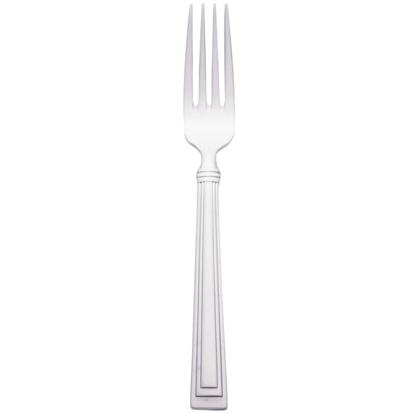 A Libbey stainless steel dinner fork with a silver handle.