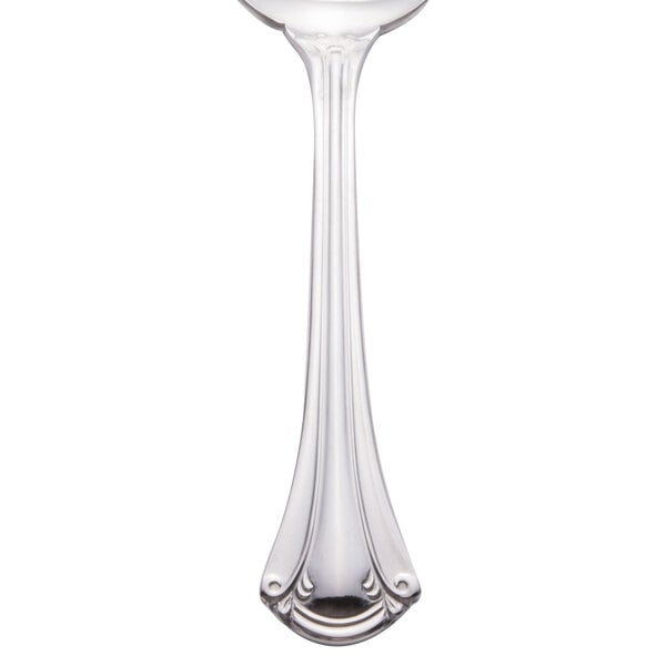 A World Tableware stainless steel bouillon spoon with a handle.