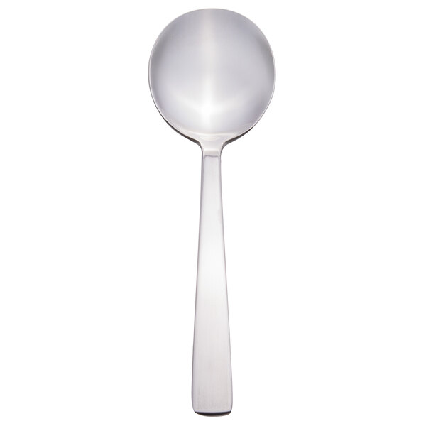 A Libbey stainless steel bouillon spoon with a silver handle.
