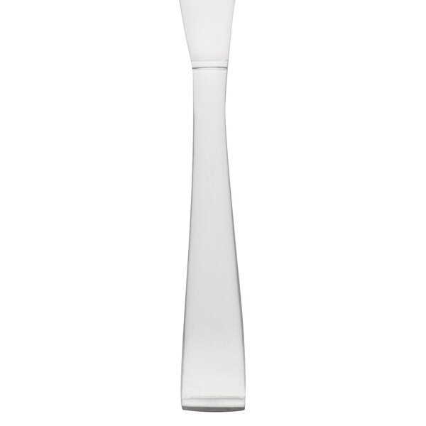 A Libbey butter spreader with a white handle and silver blade.
