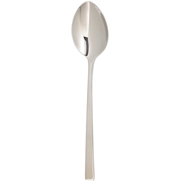 An Arcoroc stainless steel dessert spoon with a long handle.