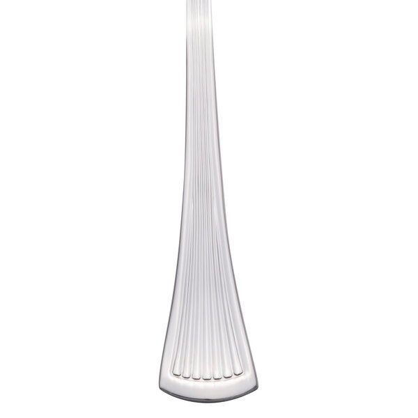 A Libbey stainless steel cocktail fork with a long handle.