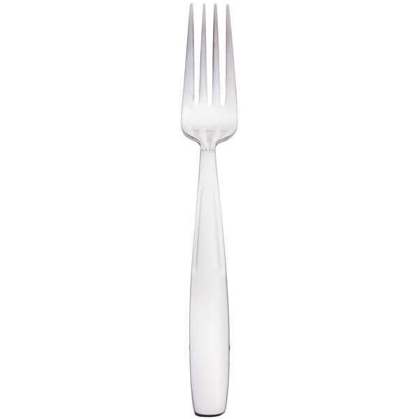A Libbey stainless steel dinner fork with a white background.
