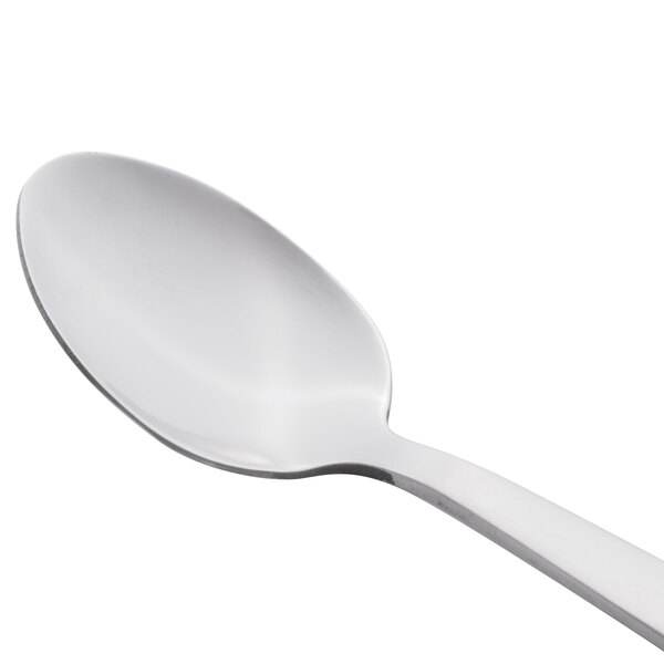 A Libbey stainless steel teaspoon with a silver handle.