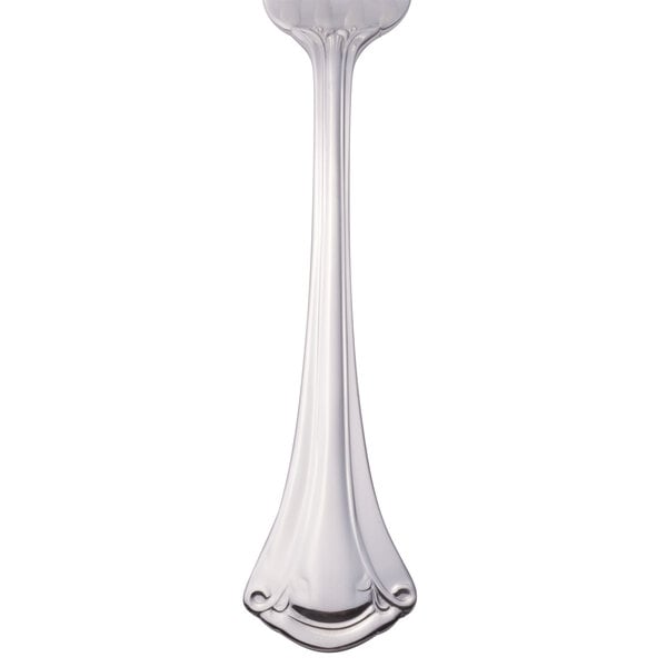 A World Tableware stainless steel dinner fork with a handle.