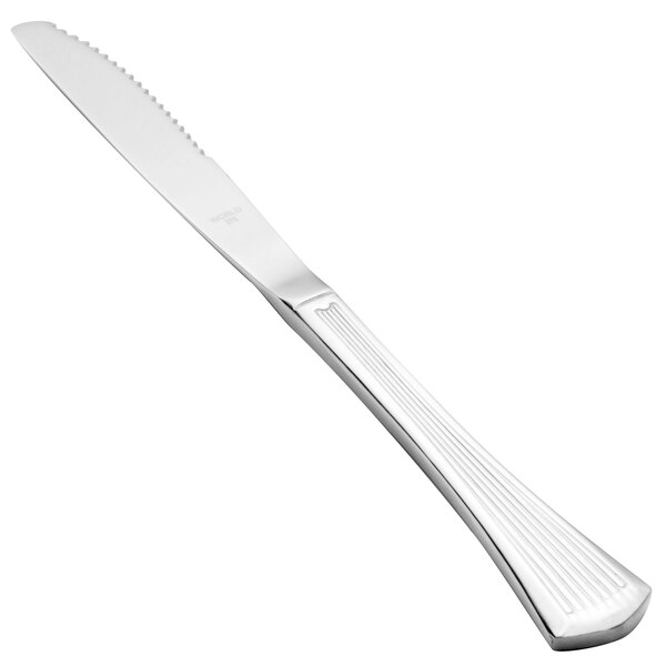 A Libbey stainless steel steak knife with a silver handle.