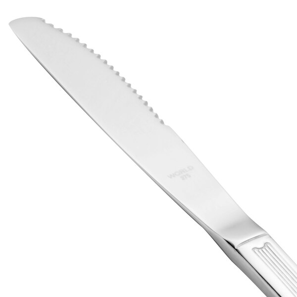 A close-up of a Libbey stainless steel steak knife with a silver handle.