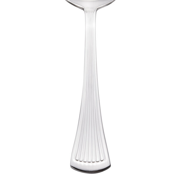 A silver Libbey Minuet bouillon spoon with a handle.