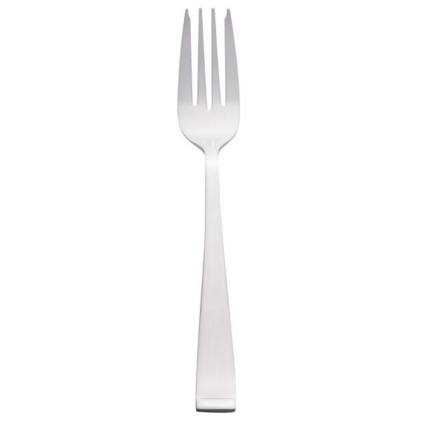 A silver fork with a white handle.
