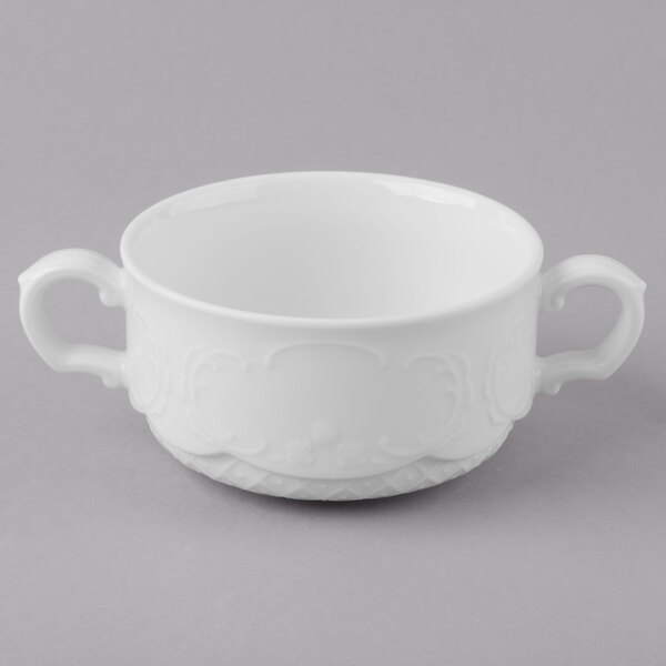 A white porcelain soup cup with two handles.