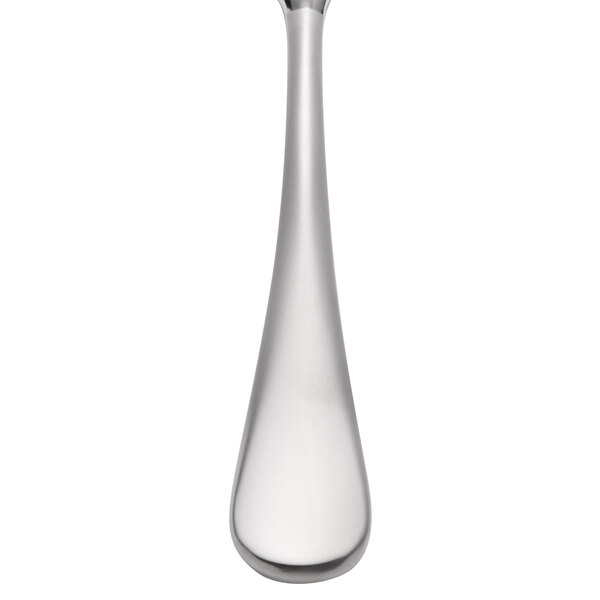A silver stainless steel cocktail fork with a long handle.