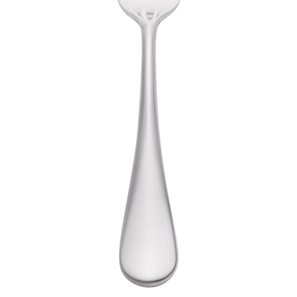A silver stainless steel salad fork with a white cylindrical handle.