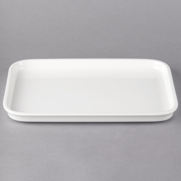 A white rectangular Villeroy & Boch porcelain serving plate with a handle.