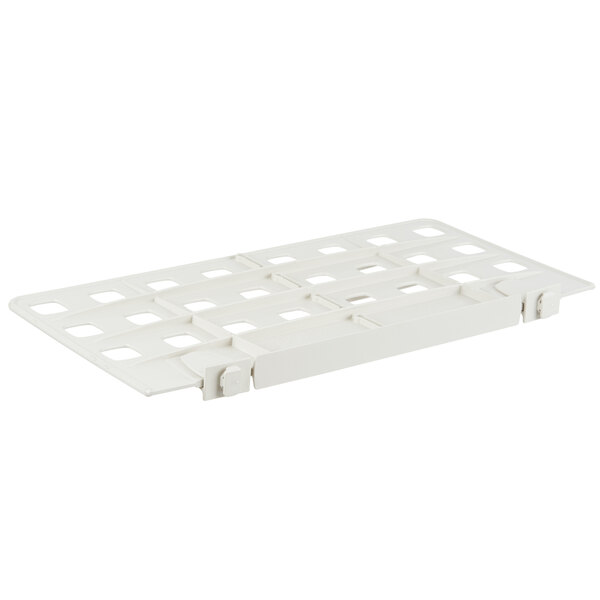 A white plastic MetroMax Q shelf divider with holes.