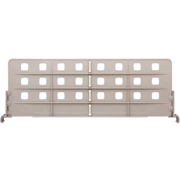 A white plastic MetroMax i shelf divider with square holes.