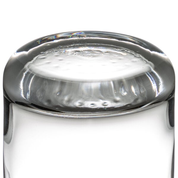 A close up of a Libbey clear glass tumbler with bubbles.