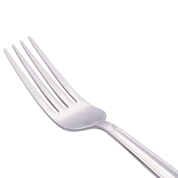 A Libbey stainless steel dinner fork with a silver handle.