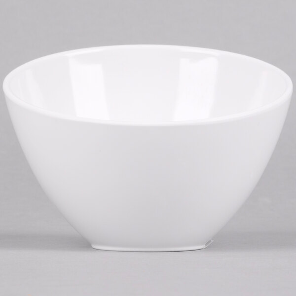 An American Metalcraft white melamine bowl on a gray surface.
