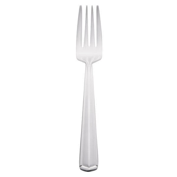 A close-up of a Libbey Vermont stainless steel salad fork with a white handle.