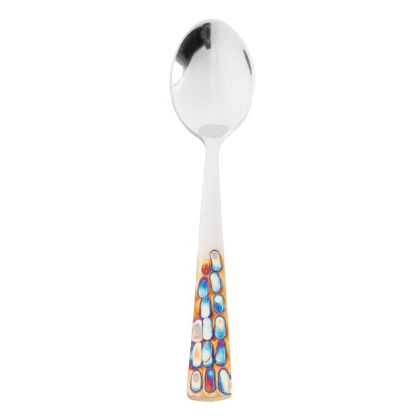 A World Tableware stainless steel teaspoon with a colorful pebblestone design on the handle.