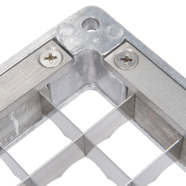A metal Nemco square blade corner with two holes.