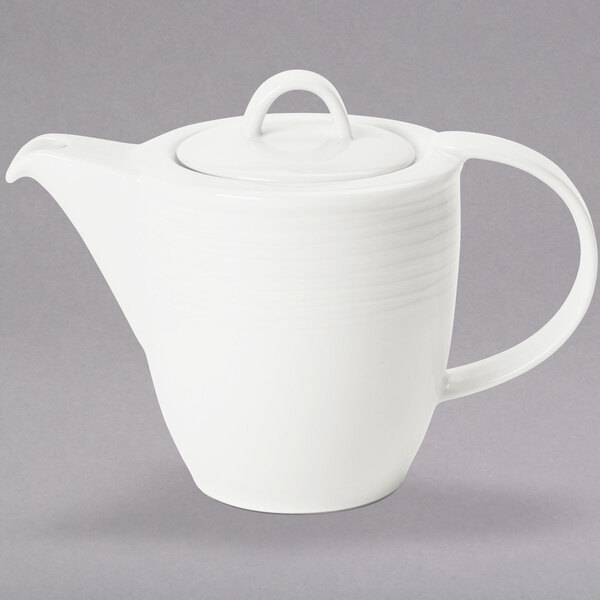 A Villeroy & Boch white porcelain teapot with a lid.