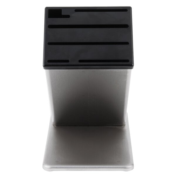 A black and silver Dexter-Russell stainless steel knife block on a counter.