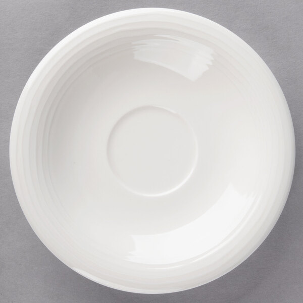 A white Villeroy & Boch porcelain saucer with a circular rim.