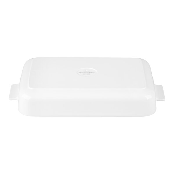 A white rectangular dish with handles on both sides, shown upside down.