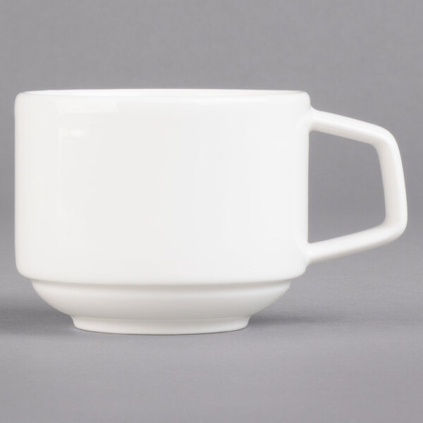 A Villeroy & Boch white porcelain stackable cup with a white handle.