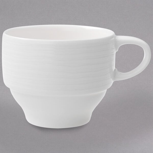 A Villeroy & Boch white porcelain cup with a handle.