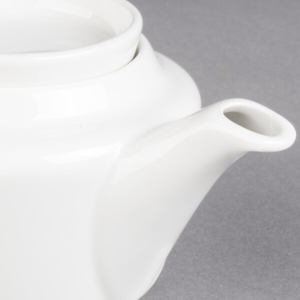 A white Villeroy & Boch porcelain teapot with a lid.