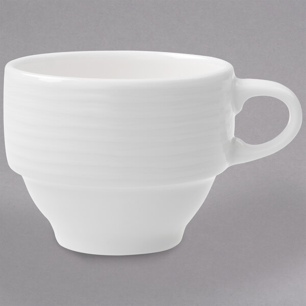 A Villeroy & Boch white porcelain cup with a handle.