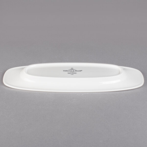 A white rectangular Villeroy & Boch porcelain platter with an oval edge.