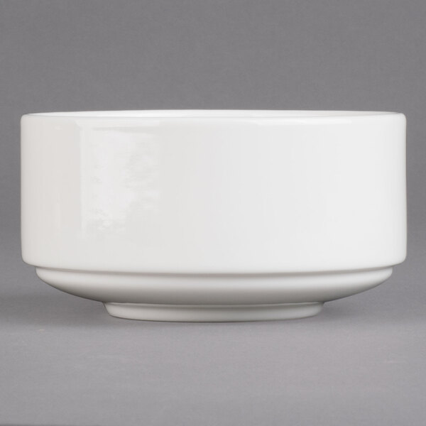 A close-up of a white Villeroy & Boch stackable soup cup.