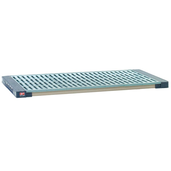 A MetroMax metal shelf with a blue polymer mat on it.