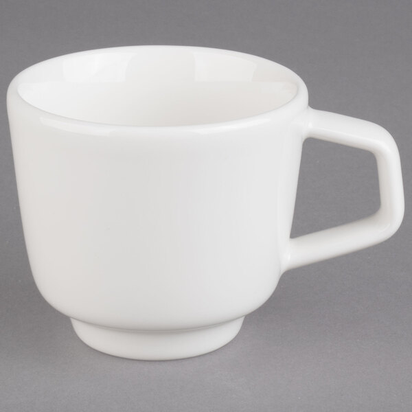 A Villeroy & Boch white porcelain coffee cup with a handle.