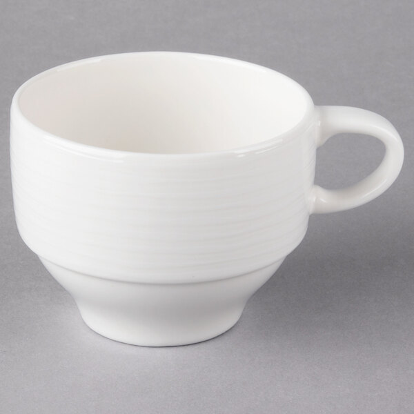 A Villeroy & Boch white porcelain cup with a handle.