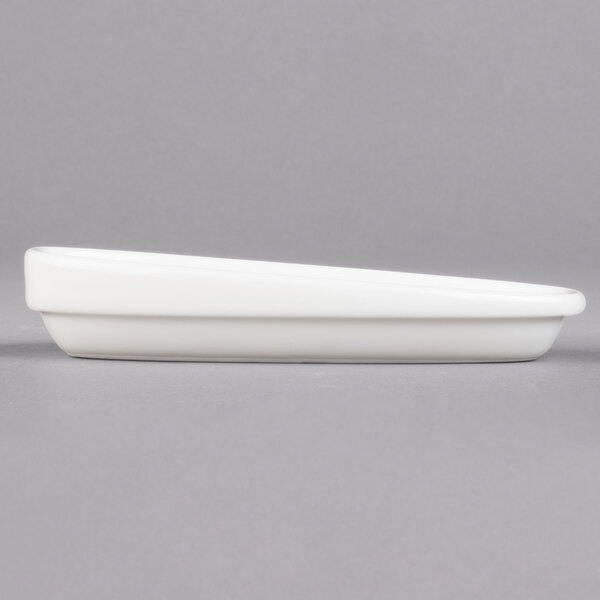 A Villeroy & Boch white porcelain sugar bowl cover with a rectangular shape.