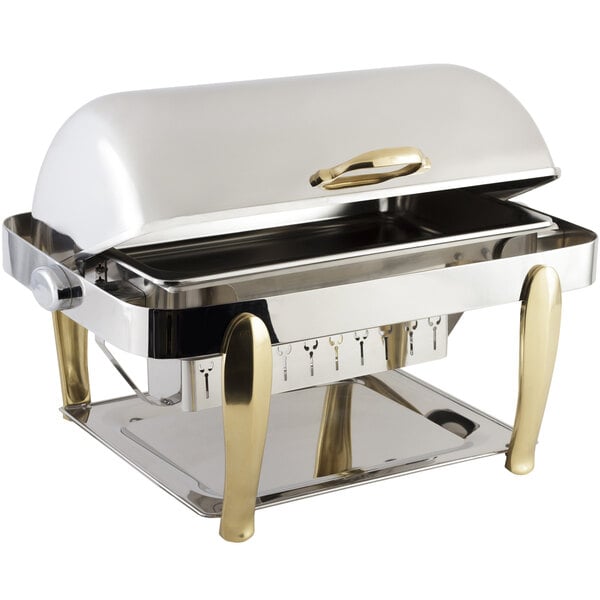 A Bon Chef stainless steel roll top chafer with brass accents and a vented lid.