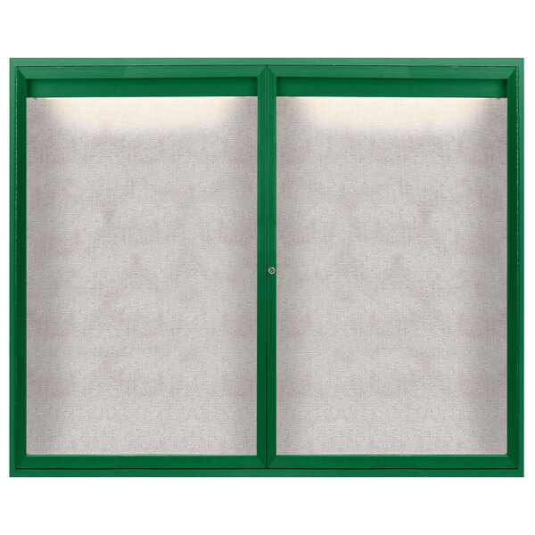 A green door with two white glass panels.