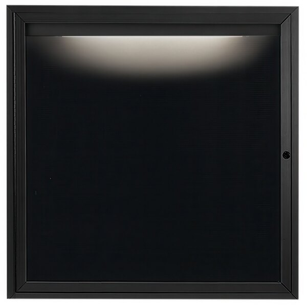A black square bulletin board with a light inside.
