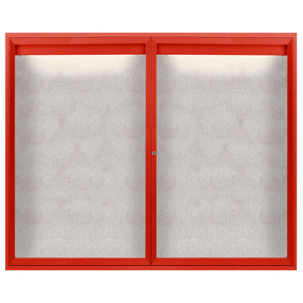 A red enclosed bulletin board with two white windows.