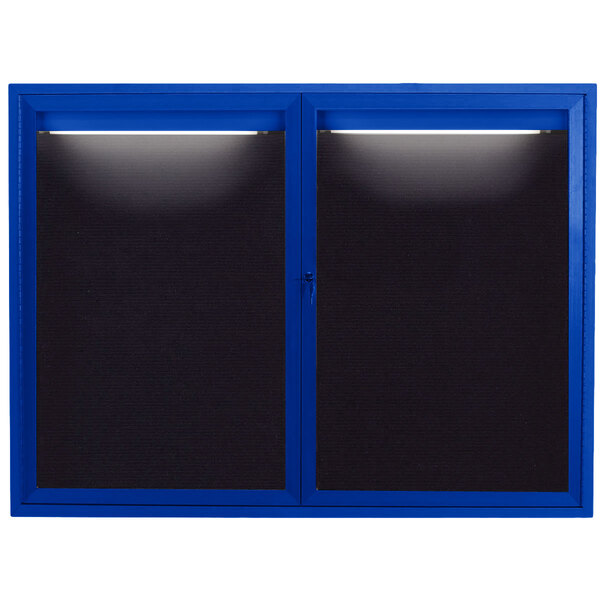 A blue rectangular bulletin board with black lettering behind two blue framed doors.